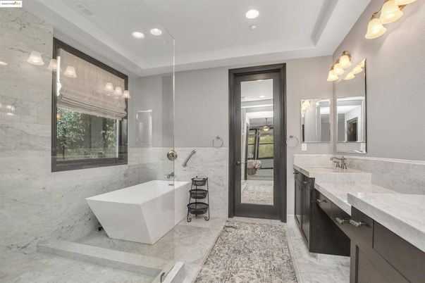 Bathroom, Dual Sink Vanities, Free Standing Baths, Glass Shower, Interior, Marble, Marble Walls, Recessed Lighting