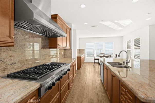 Dining room, Interior, Kitchen, Recessed Lighting, Stainless Steel Appliances, Wood Texture Flooring