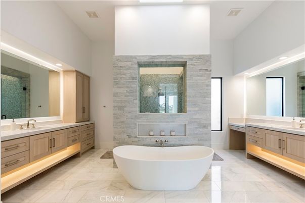 Bathroom, Dual Sink Vanities, Free Standing Baths, Interior, Marble, Recessed Lighting, Stone Walls