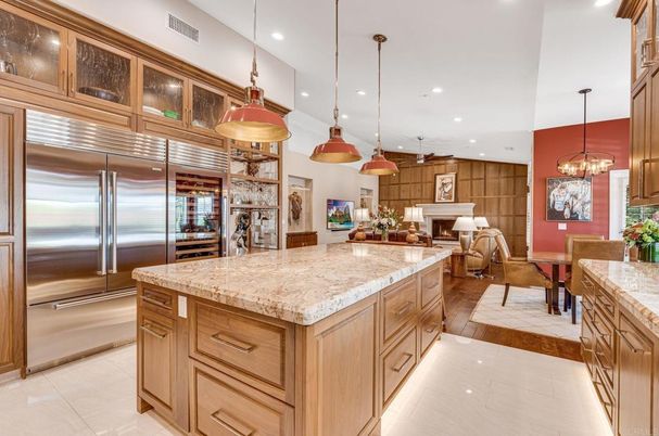 Dining room, Fireplace, Interior, Kitchen, Living room, Pendant Lights, Recessed Lighting, Stainless Steel Appliances, Wood Texture Flooring