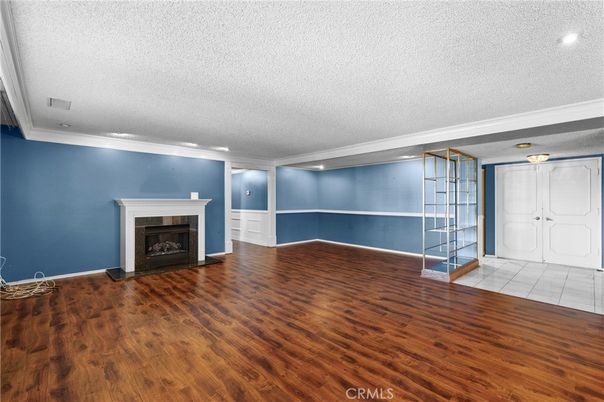 Empty room, Fireplace, Interior, Recessed Lighting, Wood Texture Flooring