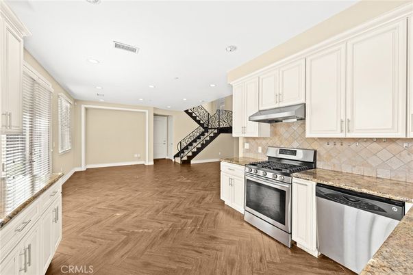 Interior, Kitchen, Recessed Lighting, Stainless Steel Appliances, Wood Texture Flooring