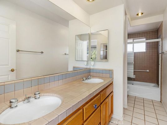 Bathroom, Dual Sink Vanities, Interior, Recessed Lighting, Tile Countertops