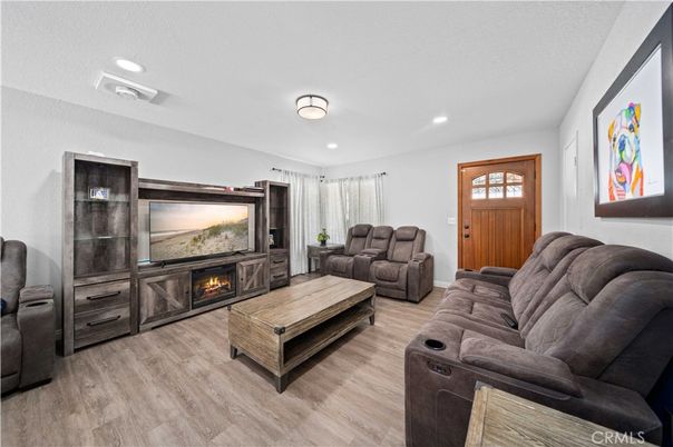 Home Theatre Room, Fireplace, Interior, Living room, Recessed Lighting, Theatre Room, Wood Texture Flooring