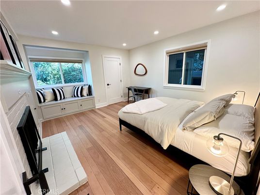 Bedroom, Fireplace, Interior, Recessed Lighting, Wood Texture Flooring