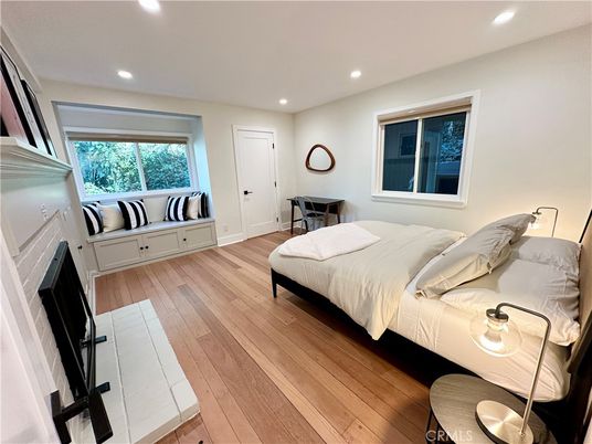 Bedroom, Fireplace, Interior, Recessed Lighting, Wood Texture Flooring