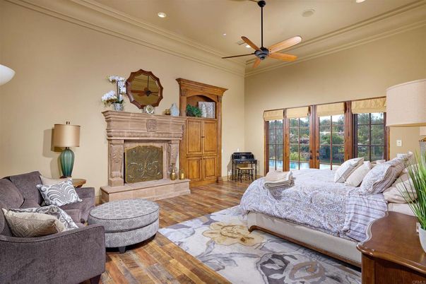Bedroom, Fireplace, Interior, Recessed Lighting, Wood Texture Flooring