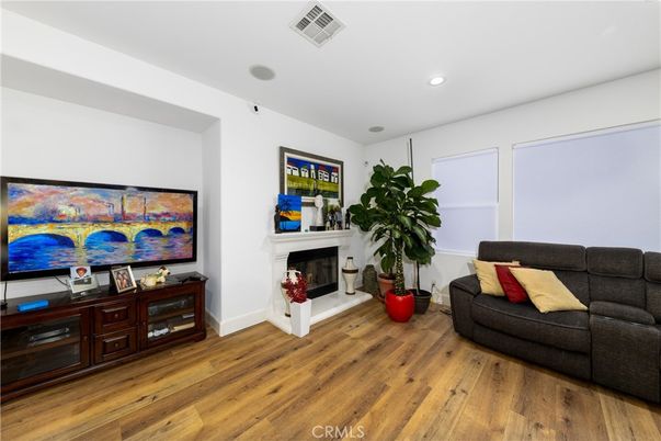 Fireplace, Interior, Living room, Recessed Lighting, Wood Texture Flooring