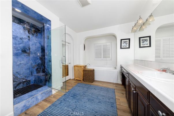 Bathroom, Glass Shower, Interior, Tile Countertops, Wood Texture Flooring
