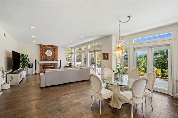 Chandelier, Dining room, Fireplace, Interior, Living room, Recessed Lighting, Wood Texture Flooring