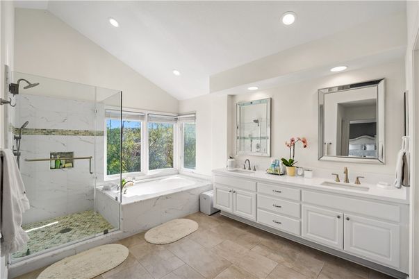 Bathroom, Dual Sink Vanities, Glass Shower, Interior, Marble Walls, Recessed Lighting