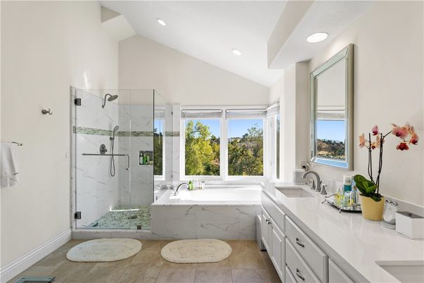 Bathroom, Dual Sink Vanities, Glass Shower, Interior, Marble Walls, Recessed Lighting