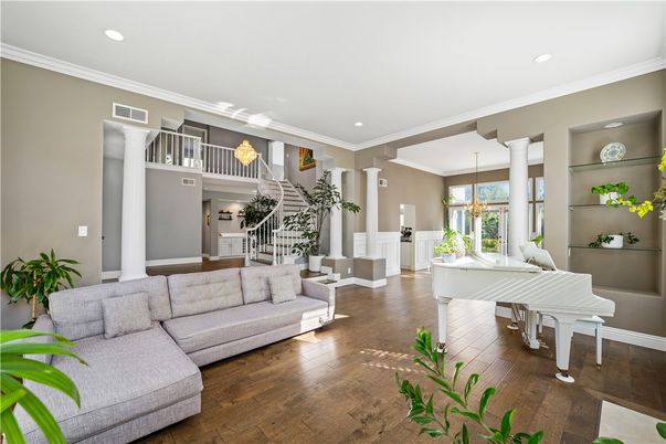 Dining room, Interior, Living room, Pendant Lights, Piano, Recessed Lighting, Wood Texture Flooring