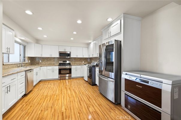 Interior, Kitchen, Recessed Lighting, Stainless Steel Appliances, Wood Texture Flooring