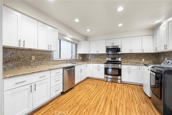 Interior, Kitchen, Recessed Lighting, Stainless Steel Appliances, Wood Texture Flooring