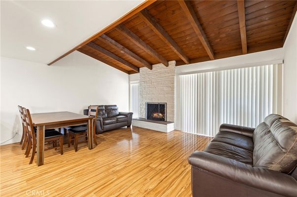 Dining room, Fireplace, Interior, Living room, Recessed Lighting, Stone Walls, Wooden Beams, Wooden Ceilings, Wood Texture Flooring