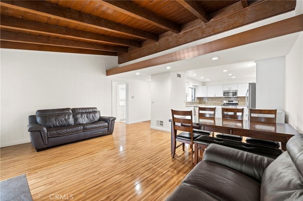 Dining room, Interior, Kitchen, Living room, Recessed Lighting, Stainless Steel Appliances, Wooden Beams, Wooden Ceilings, Wood Texture Flooring