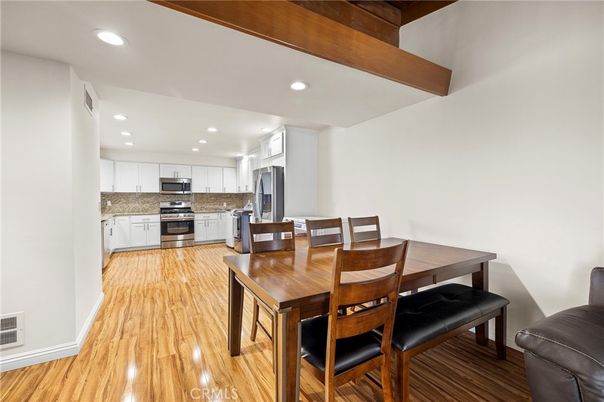 Dining room, Interior, Kitchen, Recessed Lighting, Stainless Steel Appliances, Wood Texture Flooring