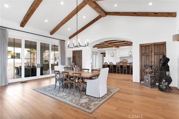 Chandelier, Dining room, Interior, Pendant Lights, Recessed Lighting, Wooden Beams, Wood Texture Flooring