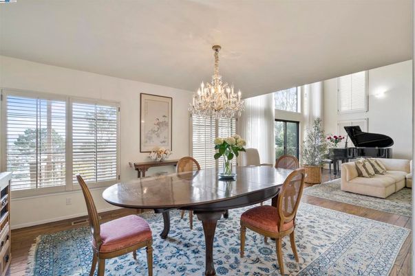 Chandelier, Dining room, Interior, Piano, Wood Texture Flooring