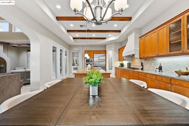 Chandelier, Dining room, Interior, Kitchen, Pendant Lights, Recessed Lighting, Stainless Steel Appliances, Wooden Beams