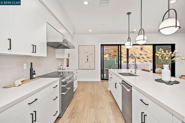 Interior, Kitchen, Pendant Lights, Recessed Lighting, Stainless Steel Appliances, Wood Texture Flooring