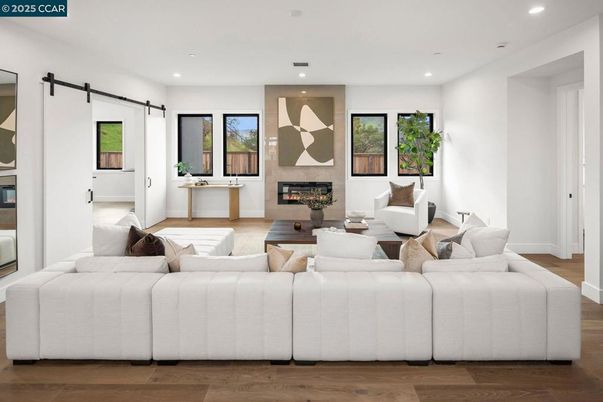 Fireplace, Interior, Living room, Recessed Lighting, Wood Texture Flooring