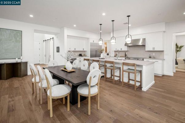 Dining room, Interior, Kitchen, Pendant Lights, Recessed Lighting, Stainless Steel Appliances, Wood Texture Flooring