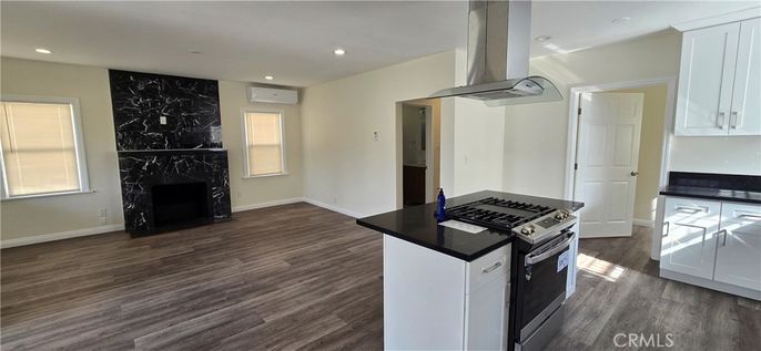 Fireplace, Interior, Kitchen, Marble Walls, Recessed Lighting, Wood Texture Flooring