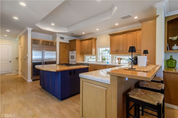 Interior, Kitchen, Recessed Lighting, Stainless Steel Appliances, Tile Countertops, Wood Texture Flooring