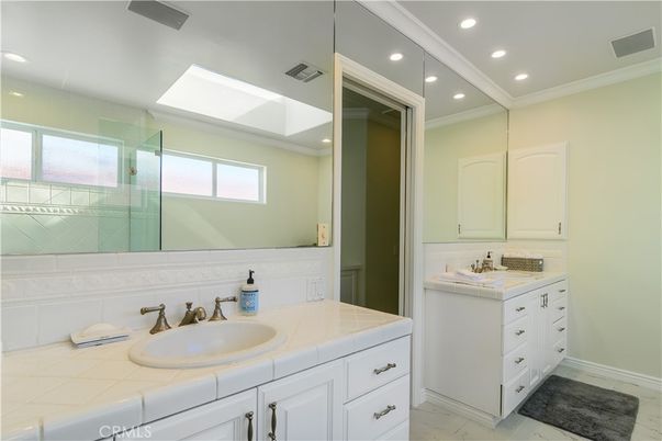Bathroom, Dual Sink Vanities, Glass Shower, Interior, Recessed Lighting, Tile Countertops