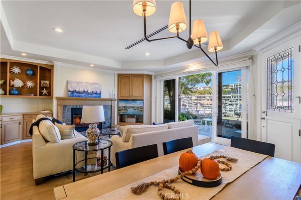 Chandelier, Dining room, Fireplace, Interior, Living room, Recessed Lighting, Wood Texture Flooring