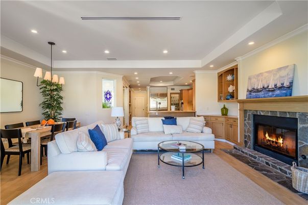 Dining room, Fireplace, Interior, Living room, Pendant Lights, Recessed Lighting, Wood Texture Flooring
