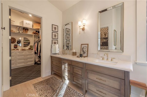 Bathroom, Dual Sink Vanities, Interior, Recessed Lighting, Walk-in Closets, Wood Texture Flooring