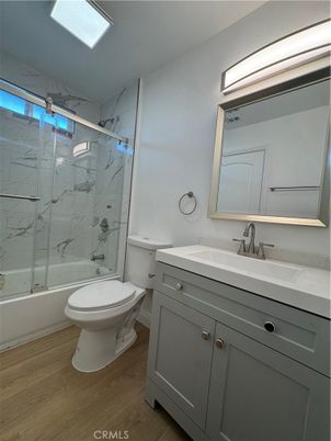 Bathroom, Glass Shower, Interior, Marble Walls, Wood Texture Flooring