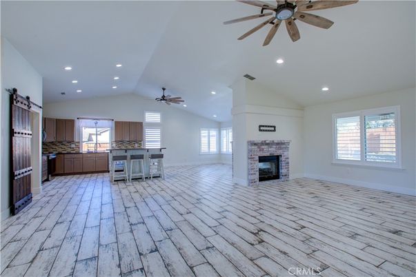 Empty room, Fireplace, Interior, Kitchen, Recessed Lighting, Wood Texture Flooring