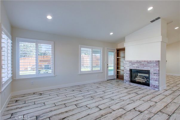 Empty room, Fireplace, Interior, Recessed Lighting, Wood Texture Flooring