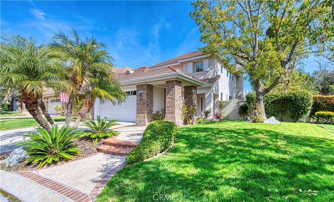 Attached, Backyard, Exterior, Facade, Brick Facade, Mediterranean