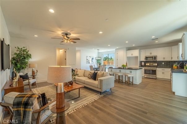 Dining room, Interior, Kitchen, Living room, Pendant Lights, Recessed Lighting, Stainless Steel Appliances, Wood Texture Flooring