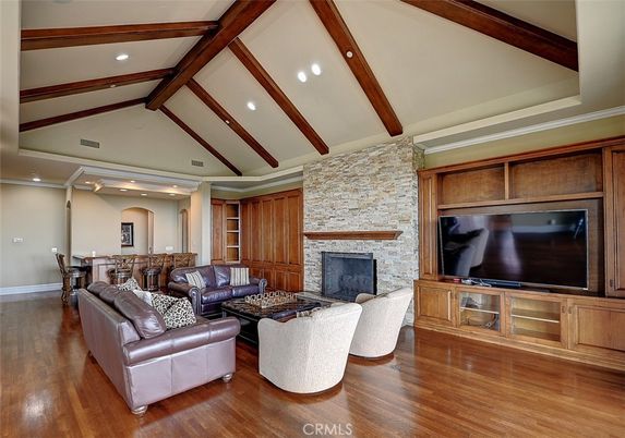 Dining room, Fireplace, Interior, Living room, Recessed Lighting, Stone Walls, Wooden Beams, Wood Texture Flooring