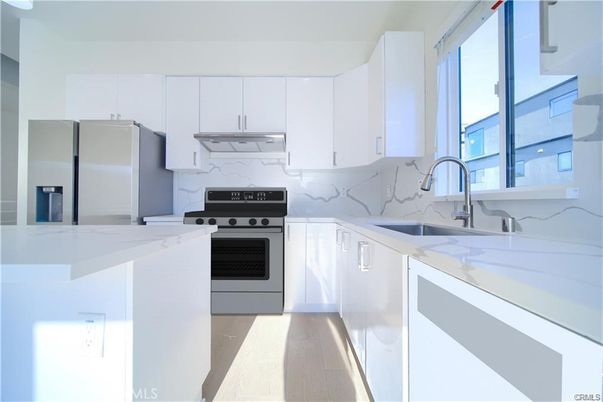Interior, Kitchen, Marble Walls, Stainless Steel Appliances, Wood Texture Flooring