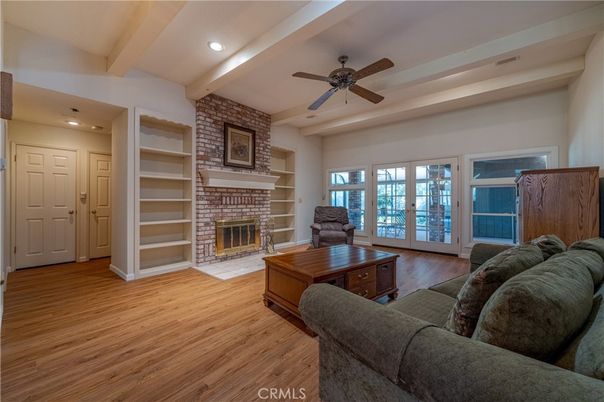 Fireplace, Interior, Living room, Recessed Lighting, Stone Walls, Wood Texture Flooring