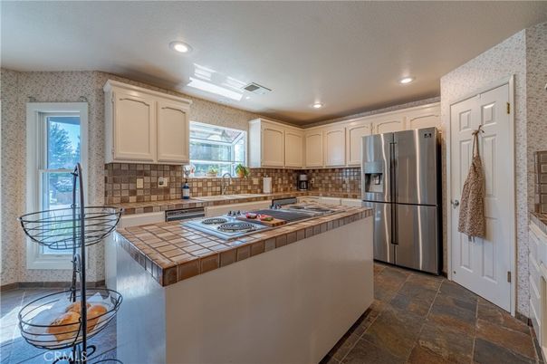 Interior, Kitchen, Recessed Lighting, Stainless Steel Appliances, Tile Countertops