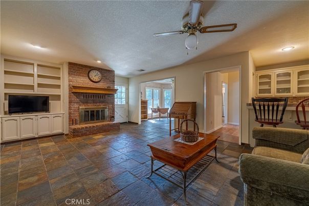 Dining room, Fireplace, Interior, Living room, Recessed Lighting, Stone Walls
