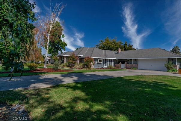 Attached, Backyard, Exterior, Facade, Brick Facade, Ranch