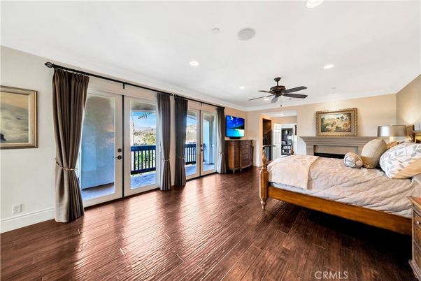 Bedroom, Fireplace, Interior, Recessed Lighting, Wood Texture Flooring