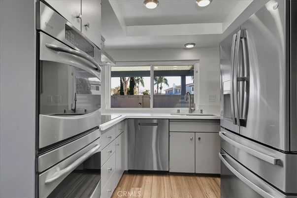 Interior, Kitchen, Recessed Lighting, Stainless Steel Appliances, Wood Texture Flooring