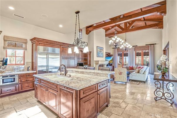 Chandelier, Interior, Kitchen, Living room, Pendant Lights, Recessed Lighting, Stainless Steel Appliances, Wooden Beams