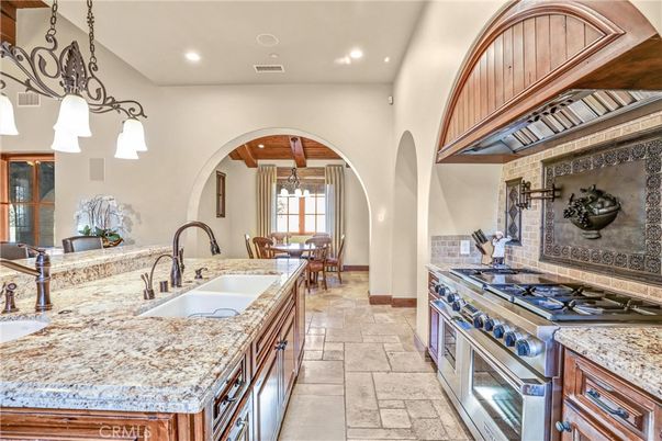 Chandelier, Dining room, Interior, Kitchen, Pendant Lights, Recessed Lighting, Stainless Steel Appliances