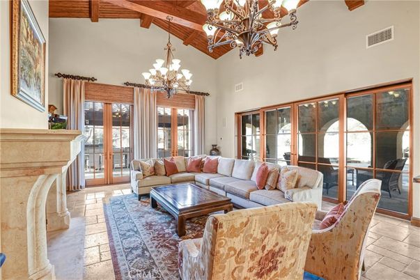 Chandelier, Fireplace, Interior, Living room, Wooden Beams